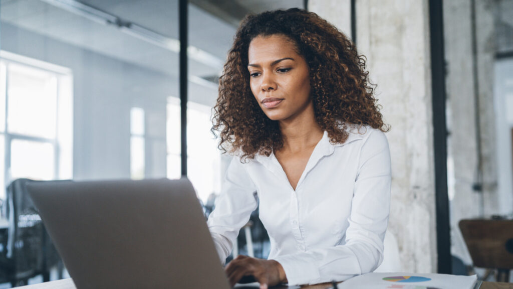 An organizational leader ponders questions while working with generative AI